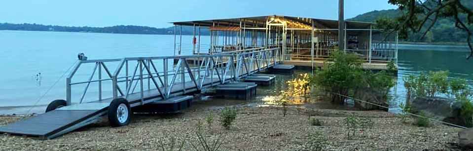 Covered boat dock at Coppermine Lodge at dusk